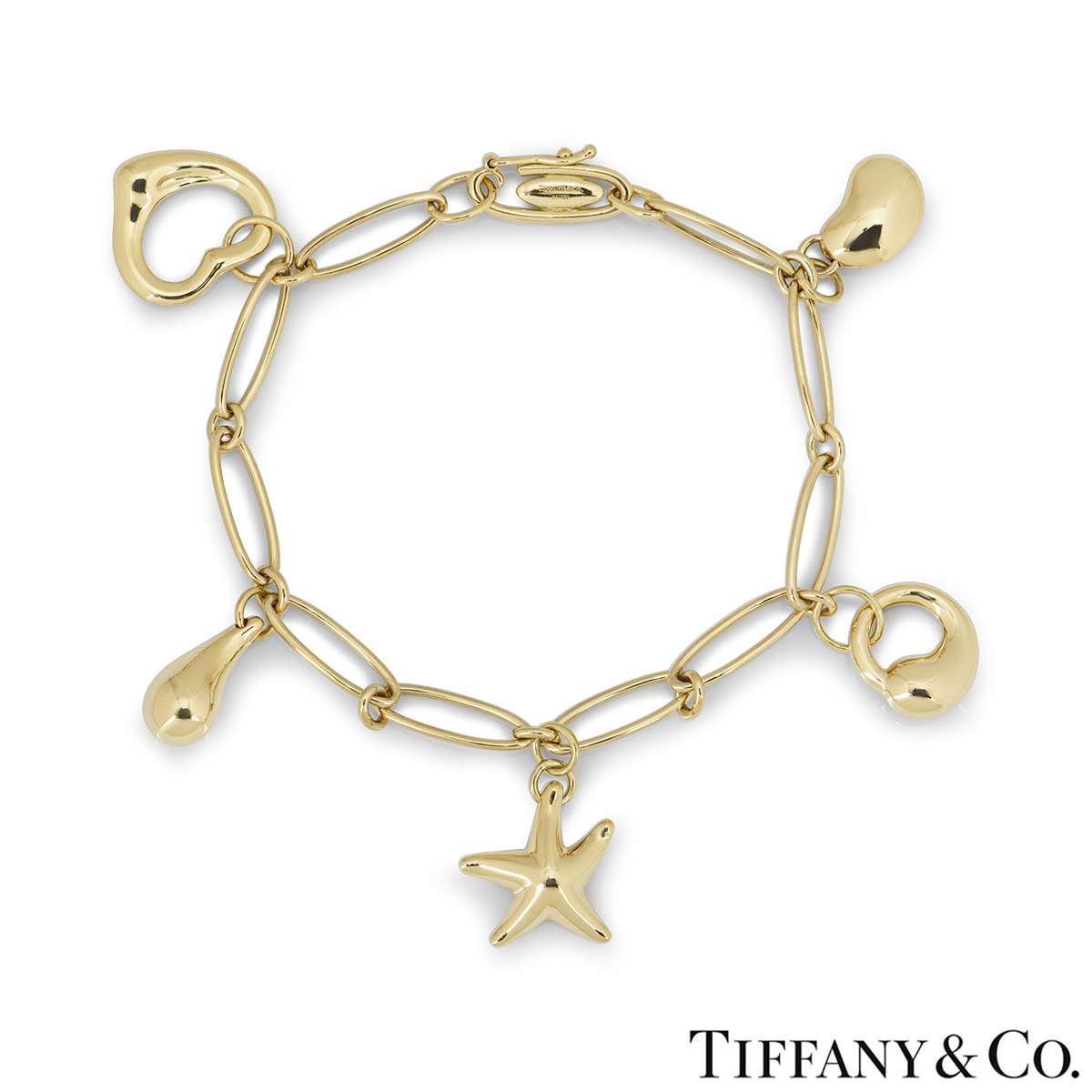 Tiffany  Co Charm Bracelet 18K Yellow Gold Cable Car Eiffel Tower  Paloma Picasso Heart  Estates Consignments Tiffany  Co Charm Bracelet  18K Yellow Gold Cable Car Eiffel Tower Paloma Picasso